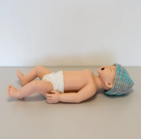 Billede af Koken Neonatal Resuscitation Model dukke.